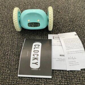 Blue Clocky Used Works Great! Battery Powered Alarm Clock On Wheels